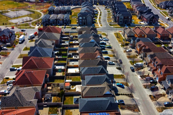 Ariel shot of a housing community, single family homes.